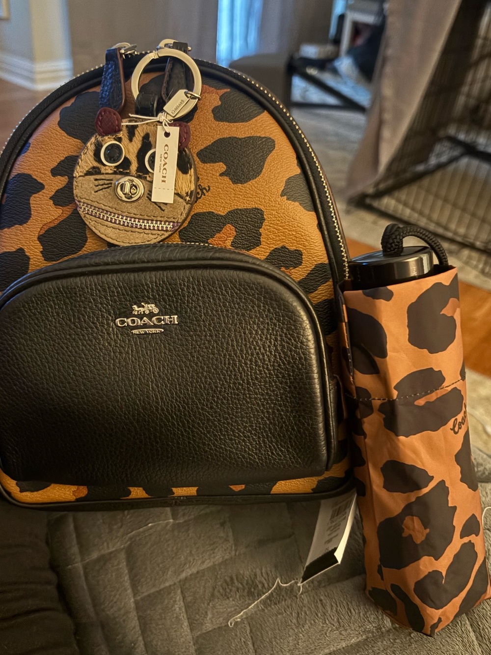 Coach Leopard Print Leather Backpack in Black and Tan